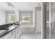 Bathroom features a double vanity, large mirror, soaking tub, and a tiled shower at 3926 Lockaby Way, Lawrenceville, GA 30044