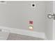 Practical laundry room with neutral walls, storage space, and convenient access points at 3926 Lockaby Way, Lawrenceville, GA 30044