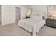 Bedroom features white furnishings and artwork at 48 Hampton Ter, Dallas, GA 30157