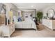 Spacious bedroom features large window, canopy bed, stylish furnishings, and neutral decor at 48 Hampton Ter, Dallas, GA 30157