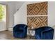 Cozy sitting area with plush armchairs, accent table and unique decor pieces at 48 Hampton Ter, Dallas, GA 30157