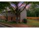 Charming townhouse with a mix of brick and siding, complemented by mature trees and a well-maintained lawn at 7750 Roswell Rd # 3D, Atlanta, GA 30350