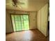 Bedroom featuring hardwood flooring and a sliding glass door at 1024 Topaz Lane, Villa Rica, GA 30180