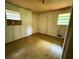 This bedroom has laminate flooring and plenty of sunlight at 1024 Topaz Lane, Villa Rica, GA 30180