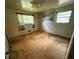 Bedroom features two windows, ceiling fan, and wall art ready for customization and personalization at 1024 Topaz Lane, Villa Rica, GA 30180