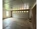 Garage featuring a large garage door, room for parking, and lots of storage opportunities at 1024 Topaz Lane, Villa Rica, GA 30180