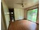 Unfurnished living room featuring bare walls, and a sliding glass door at 1024 Topaz Lane, Villa Rica, GA 30180