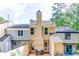 Exterior backyard view features a deck area perfect for outdoor seating at 2972 Aspen Woods Entry, Atlanta, GA 30360