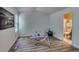 Versatile bonus room featuring exercise equipment and an adjacent bathroom at 2972 Aspen Woods Entry, Atlanta, GA 30360