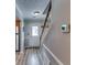 Inviting entryway features hardwood floors, staircase, and access to various living spaces at 2972 Aspen Woods Entry, Atlanta, GA 30360