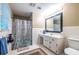 Bathroom with a window, updated fixtures, and ample counter space plus plenty of natural light at 5410 Rosser Rd, Stone Mountain, GA 30087