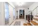 Bright foyer with tile flooring, staircase, and ample natural light, creating a welcoming entrance at 5410 Rosser Rd, Stone Mountain, GA 30087