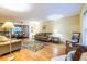 Spacious living room with hardwood floors and neutral walls, offering a versatile and welcoming space at 5410 Rosser Rd, Stone Mountain, GA 30087