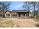 Charming brick home with a welcoming front porch and mature trees at 108 Deer Creek Run, Moreland, GA 30259