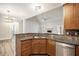 Open concept kitchen with granite countertop and stainless steel appliances at 108 Deer Creek Run, Moreland, GA 30259
