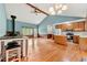 Bright open-concept living room featuring hardwood floors and a vaulted ceiling at 57 Fair Oaks Se Dr, Conyers, GA 30094