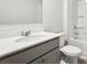 Bathroom with double sink vanity, large mirror, and combined tub and shower at 62 Hampton Ter, Dallas, GA 30157