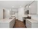 Well-equipped kitchen with granite countertops, stainless steel appliances, and gray cabinetry at 62 Hampton Ter, Dallas, GA 30157