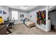 Neutrally painted bedroom featuring carpet, a full-sized bed, and a gaming station at 1359 Chatley Way, Woodstock, GA 30188
