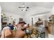 Bright living room with fireplace, large windows, and stylish furniture arrangement creates a comfortable gathering space at 1359 Chatley Way, Woodstock, GA 30188