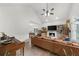 Bright living room with fireplace, large windows, and stylish furniture arrangement creates a comfortable gathering space at 1359 Chatley Way, Woodstock, GA 30188
