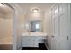 Bathroom with a vanity, makeup counter, and mirror over the sink, perfect for getting ready at 3802 Birchbriar Ct, Decatur, GA 30034