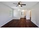 Spacious bedroom with hardwood floors leading to an ensuite bathroom, creating a private retreat at 3802 Birchbriar Ct, Decatur, GA 30034