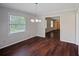 Dining room leading to living space with hardwood floors at 3802 Birchbriar Ct, Decatur, GA 30034