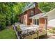 Brick two story home with a large patio and manicured backyard at 4243 Mcclatchey Ne Cir, Atlanta, GA 30342