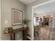 Inviting entryway showcasing wood floors and a glimpse into the bright, open-concept kitchen at 4243 Mcclatchey Ne Cir, Atlanta, GA 30342