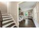 Hallway and foyer featuring hardwood floors and views of the living spaces at 4243 Mcclatchey Ne Cir, Atlanta, GA 30342