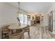 Bright kitchen with white cabinets, stainless appliances, and hardwood-look floors at 4243 Mcclatchey Ne Cir, Atlanta, GA 30342