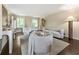 Spacious living room featuring stylish furniture, hardwood floors and bright sunlight at 4243 Mcclatchey Ne Cir, Atlanta, GA 30342