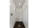 Walk-in shower with white subway tile, black honeycomb flooring, and a rainfall shower head at 4243 Mcclatchey Ne Cir, Atlanta, GA 30342