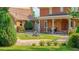 Charming backyard with a fire pit, patio, and a covered seating area at 110 Amsterdam Dr, Lilburn, GA 30047