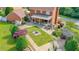 Expansive backyard featuring a fire pit, pergola, and covered patio perfect for entertaining at 110 Amsterdam Dr, Lilburn, GA 30047