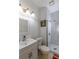 Modern bathroom featuring a glass-enclosed shower and white vanity at 110 Amsterdam Dr, Lilburn, GA 30047