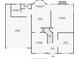 Detailed floor plan showcasing the layout of the home, including kitchen, living room, and bedrooms at 2304 Mitford Ct, Dacula, GA 30019