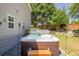 Exterior shot of a hot tub with landscaping at 2304 Mitford Ct, Dacula, GA 30019