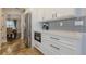 Modern kitchen featuring stainless steel appliances and ample countertop space at 2304 Mitford Ct, Dacula, GA 30019