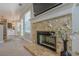 Living room with fireplace and view to patio at 2304 Mitford Ct, Dacula, GA 30019