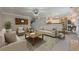 Open concept living room with a view to the kitchen and dining area at 2304 Mitford Ct, Dacula, GA 30019