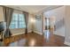 Well-lit office featuring hardwood floors, neutral walls, and a view of the landscaped yard at 2304 Mitford Ct, Dacula, GA 30019