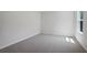 Bedroom with carpet, neutral paint, and a window for natural light at 80 Hampton Ter, Dallas, GA 30157