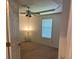 Bedroom includes a ceiling fan and window for natural light at 851 Shore Dr, Lithonia, GA 30058