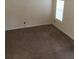 Bright bedroom with carpet and a window providing natural light, offering a serene retreat at 851 Shore Dr, Lithonia, GA 30058