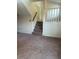 Staircase leading to the next level, with carpet and handrail, blending functionality with design at 851 Shore Dr, Lithonia, GA 30058