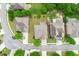 An aerial view of a neighborhood showcasing well-maintained homes, green lawns, and neatly lined streets at 4677 Prater Se Way, Smyrna, GA 30080