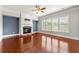 Cozy living room with fireplace and large windows for ample natural light at 4677 Prater Se Way, Smyrna, GA 30080