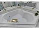 A luxurious bathtub is the centerpiece of this stylish and elegant bathroom at 4901 Briarleigh Chase Sw, Mableton, GA 30126